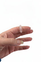 Treasured Energies crystal sphere holders worn on a finger close up