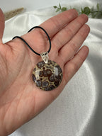 Poppy Jasper Round held in hand