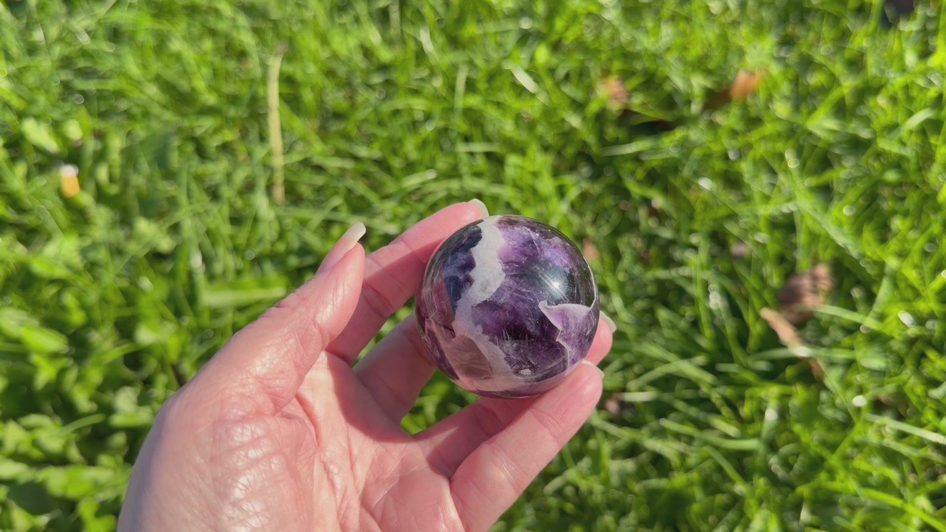 Polished Chevron Amethyst Crystal Sphere