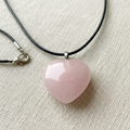 Rose Quartz Heart Pendant on Linen Close-Up