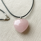 Rose Quartz Heart Pendant on Linen Close-Up