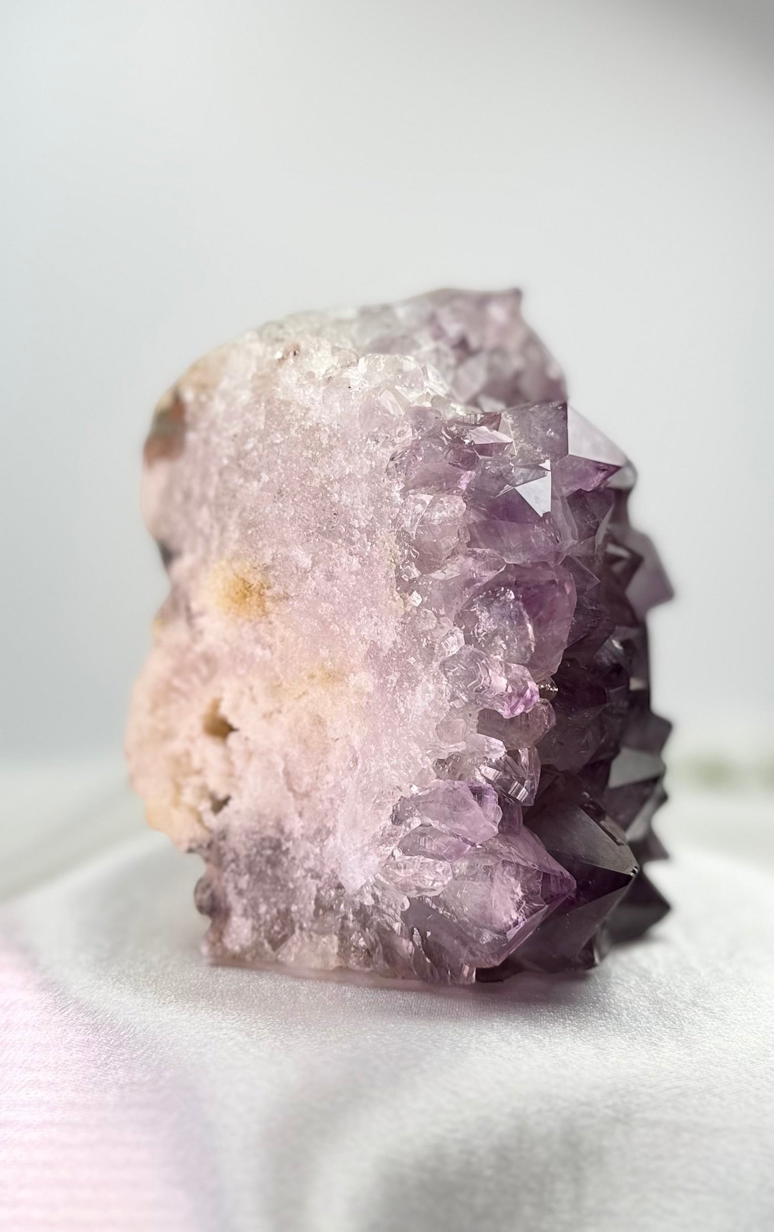 Treasured Energies natural amethyst crystal cluster with deep purple points and a raw textured base