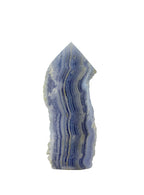 Treasured Energies Blue Lace Agate crystal tower with delicate blue and white banded layers on a white background.
