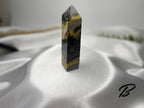 Treasured Energies Bumblebee Jasper crystal tower with distinct yellow, black, and grey banded volcanic layers.