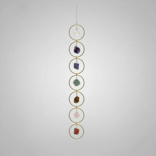 Treasured Energies 7 Chakra crystal window hanging with raw gemstones in gold circles for boho home decor.