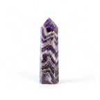 Treasured Energies Chevron Amethyst crystal tower with distinct purple and white V-shaped bands on a white background.