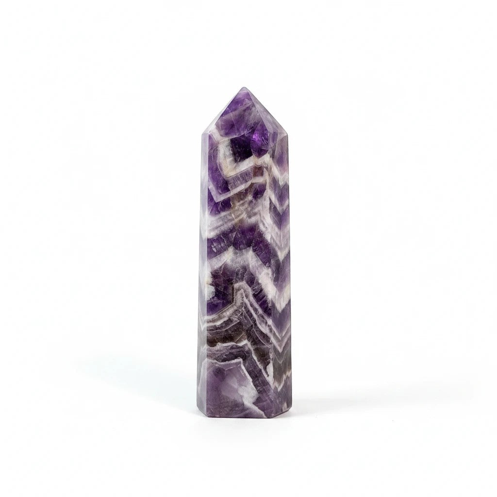 Treasured Energies Chevron Amethyst crystal tower with distinct purple and white V-shaped bands on a white background.