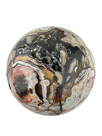 Treasured Energies polished Crazy Lace Agate crystal sphere featuring intricate swirling patterns and a natural druzy geode