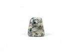 Treasured Energies polished Crazy Lace Agate tumbled stone with intricate grey, white, and black swirling patterns.