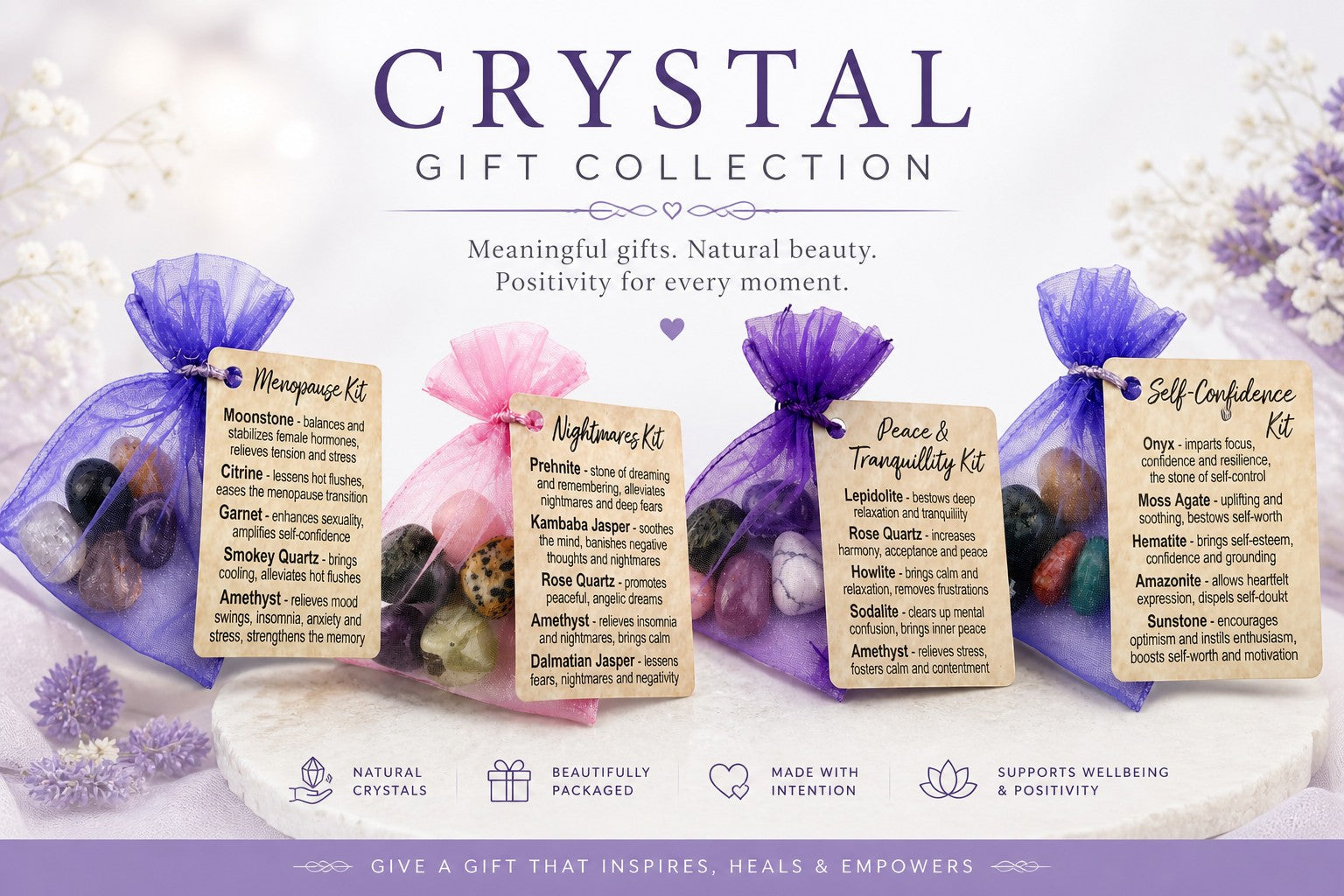 Treasured Energies crystal healing kits in purple organza bags with informational tags on a white display surface.