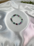 Treasured Energies fluorite crystal gemstone beaded stretch bracelet with purple and green translucent crystal beads on silk