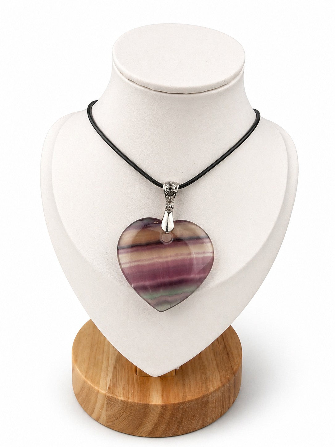 Treasured Energies heart-shaped fluorite crystal pendant necklace with purple and green banded crystal on a black cord
