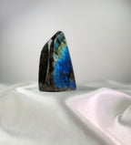 Treasured Energies large polished Labradorite freeform crystal displaying vibrant blue and gold labradorescence.
