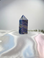 Treasured Energies Lapis Lazuli crystal tower with deep blue tones, golden pyrite, and white calcite inclusions.
