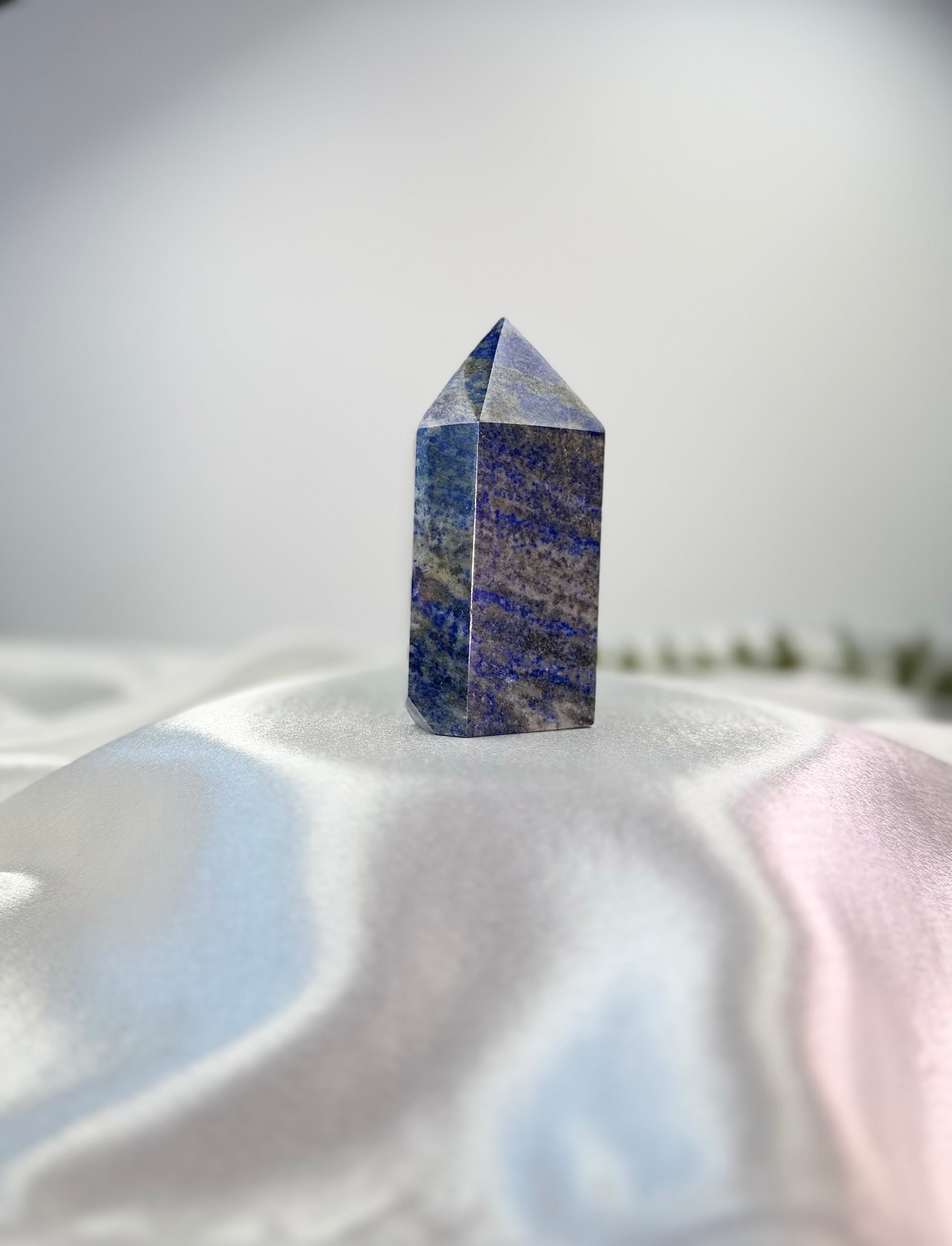 Treasured Energies Lapis Lazuli crystal tower with deep blue tones, golden pyrite, and white calcite inclusions.