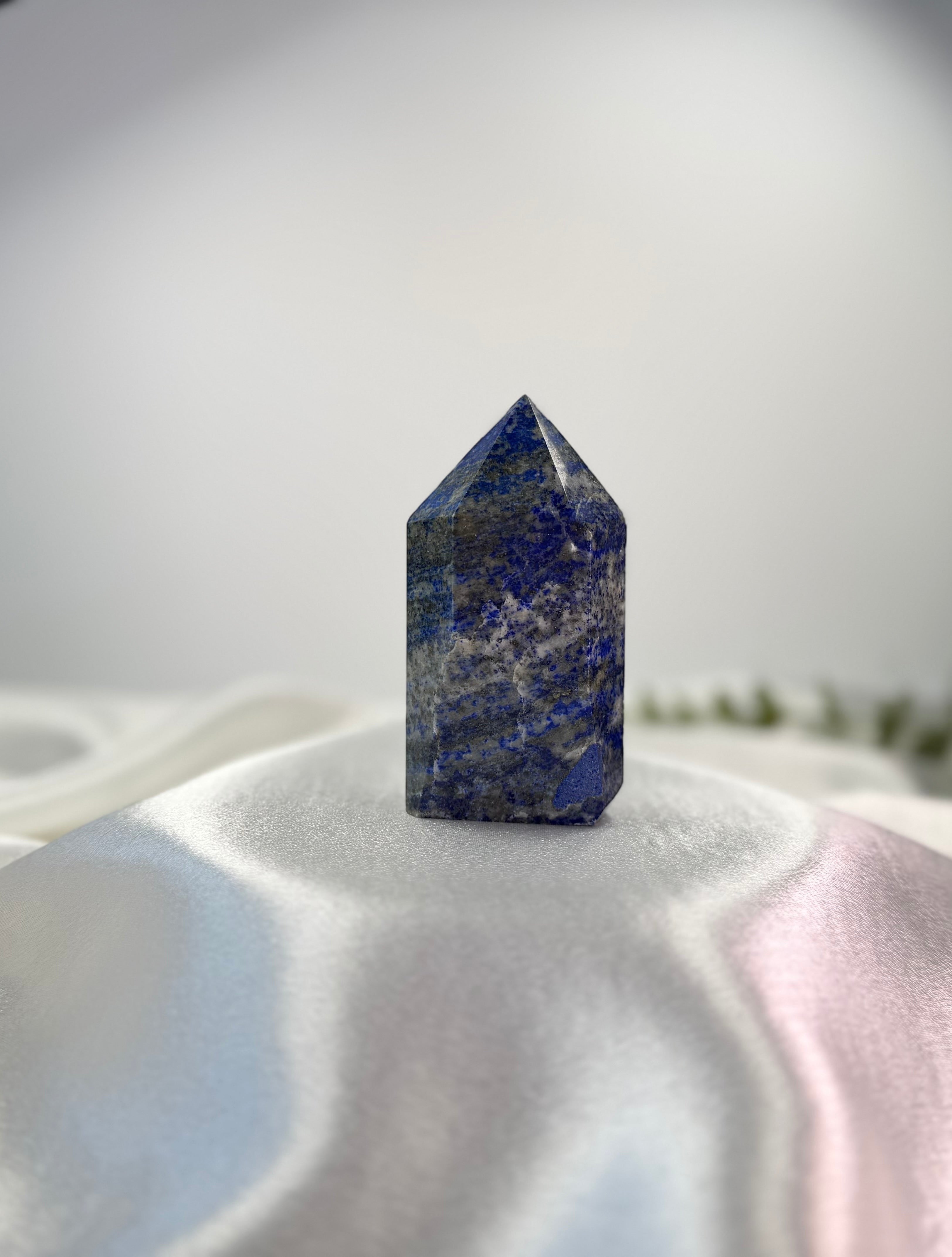 Treasured Energies medium Lapis Lazuli crystal tower with deep blue colour, golden pyrite, and white calcite flecks.