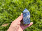 Treasured Energies medium Lapis Lazuli crystal tower with deep blue colour, golden pyrite, and white calcite flecks.