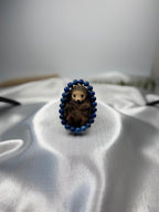 Treasured Energies Lapis Lazuli bracelet beaded elastic bracelet featuring a cute carved wooden hedgehog charm on white silk