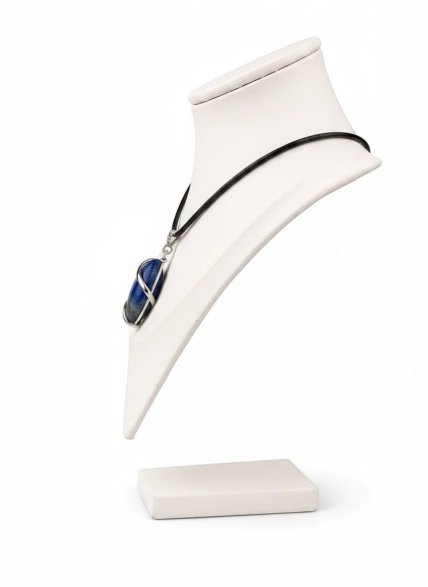Treasured Energies Lapis Lazuli crystal pendant in a silver wire wrap on a black cord necklace displayed on a bust