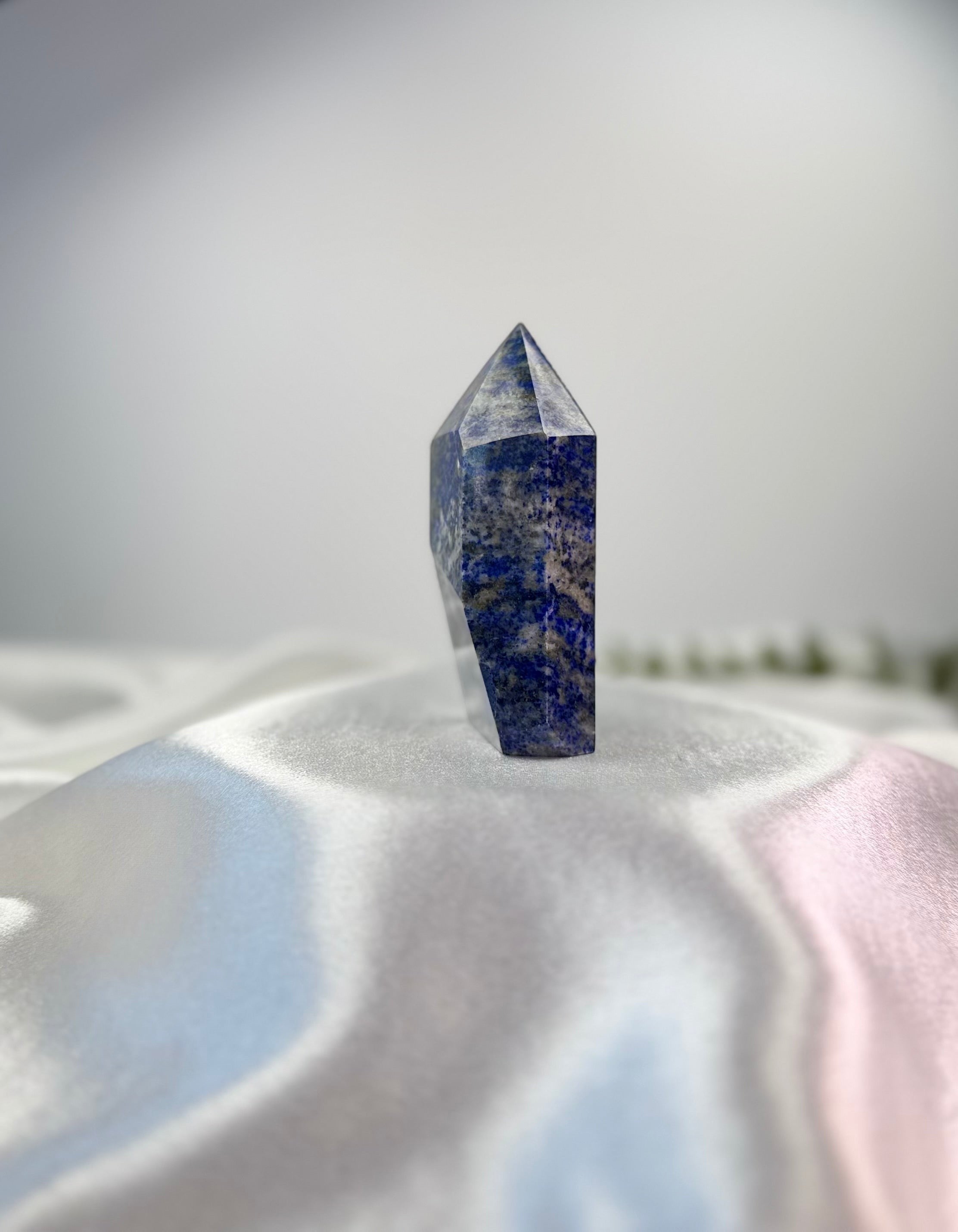 Treasured Energies medium Lapis Lazuli crystal tower with deep blue colour, golden pyrite, and white calcite inclusions.