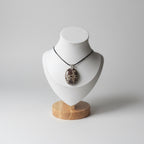 Treasured Energies polished poppy Jasper pendant with brown and cream spots on a black cord necklace
