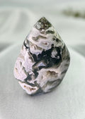 Treasured Energies polished moss agate flame crystal sculpture with green and white organic mineral patterns.