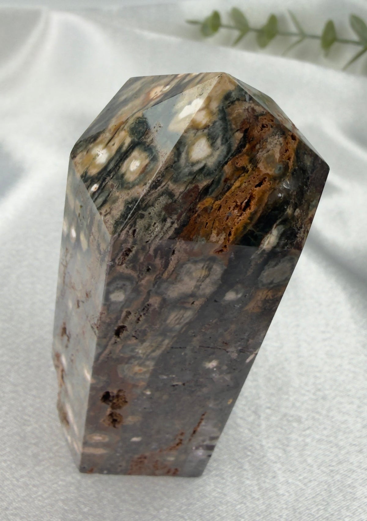 Treasured Energies polished Ocean Jasper crystal tower with orbicular patterns in grey, green, and brown tones.