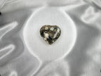 Treasured Energies large heart-shaped Ocean Jasper crystal with polished grey, green, and white orbicular patterns.