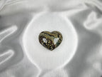 Treasured Energies large heart-shaped Ocean Jasper crystal with polished green, brown, and cream orbicular patterns.