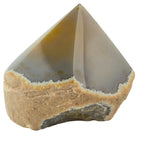 Treasured Energies polished agate point with natural raw base and smooth grey banded crystal top.