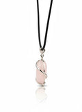 Treasured Energies rose quartz crystal pendant wrapped in silver wire on a black cord necklace against a white background.