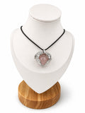 Treasured Energies rose quartz heart crystal necklace with silver angel wings on a black cord, displayed on a bust.