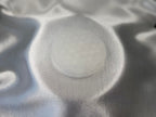 Treasured Energies 8cm round white selenite charging plate with a sacred geometry flower of life engraving on satin