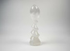 Treasured Energies translucent white selenite crystal sculpture with a spiral design on a plain background