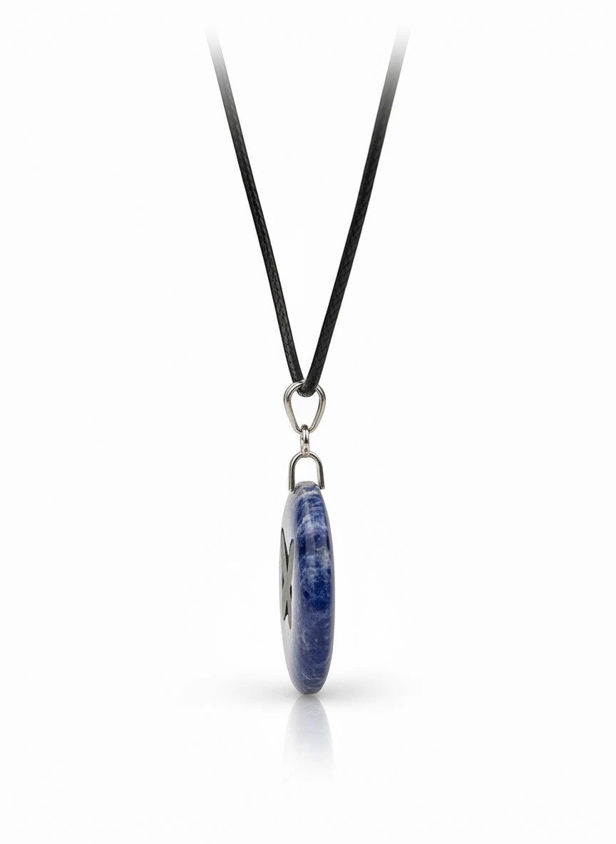 Treasured Energies blue sodalite donut ring necklace with a silver butterfly pendant on a black cord