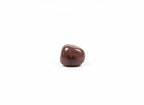 Treasured Energies polished strawberry quartz tumbled stone with a smooth, deep pinkish-red surface on a white background.
