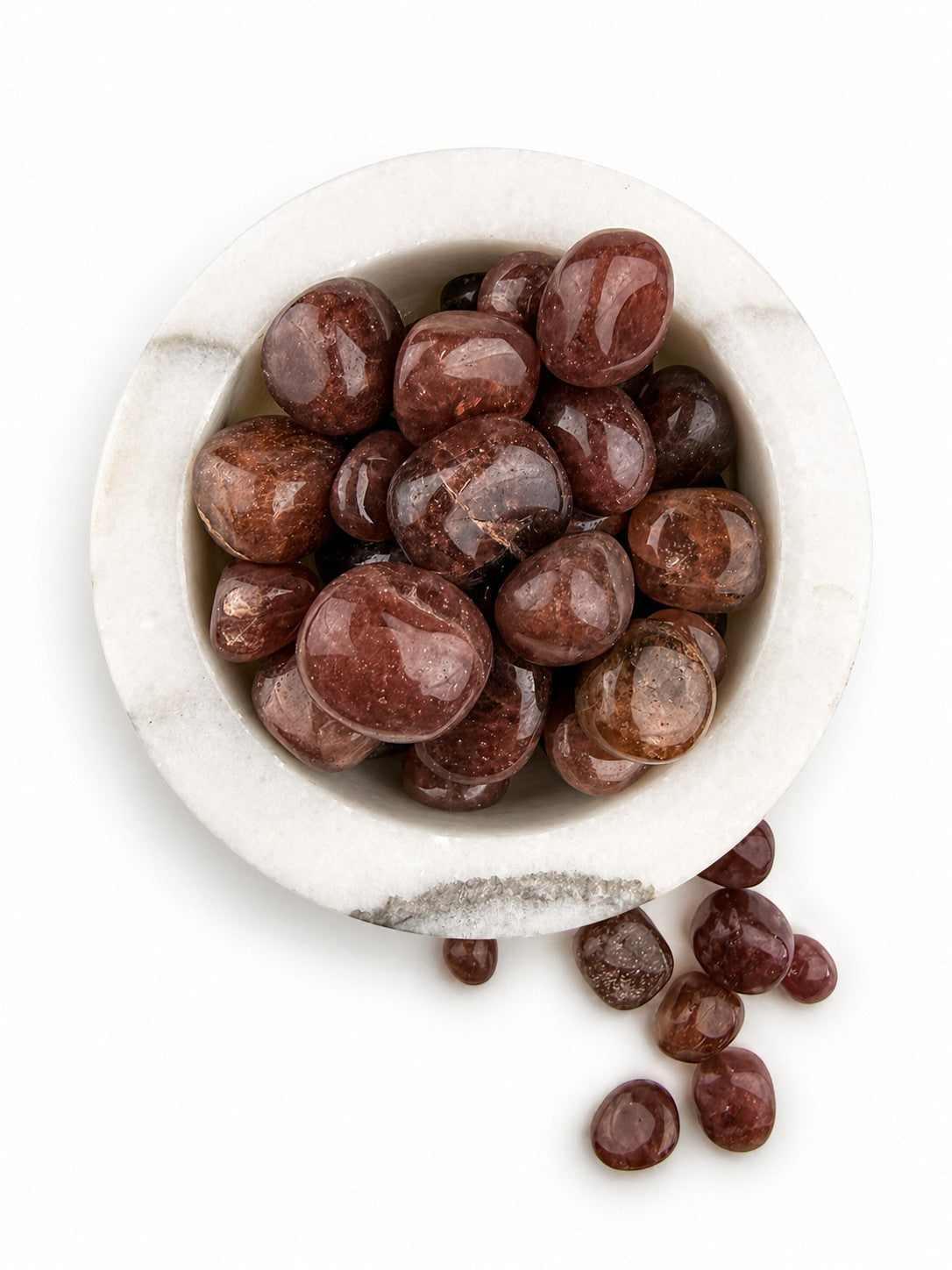 Treasured Energies polished strawberry quartz tumbled stones in a white marble bowl for healing and meditation