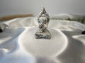 Treasured Energies tree agate yoga woman carving with white and green dendritic patterns on a satin background