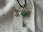 Treasured Energies turquoise triple moon goddess pendant necklace with a teardrop charm on a black cord