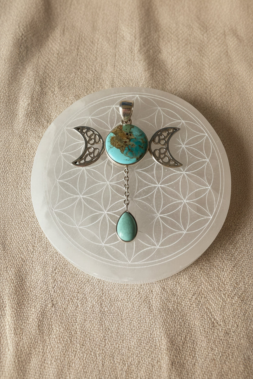 Treasured Energies turquoise triple moon goddess pendant necklace with a teardrop stone on a black cord