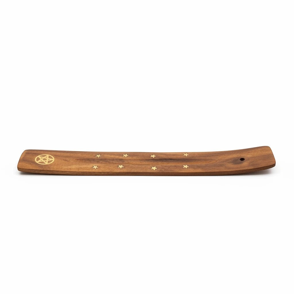Treasured Energies wooden incense holder featuring a brass pentagram and star inlay on a curved rectangular base.