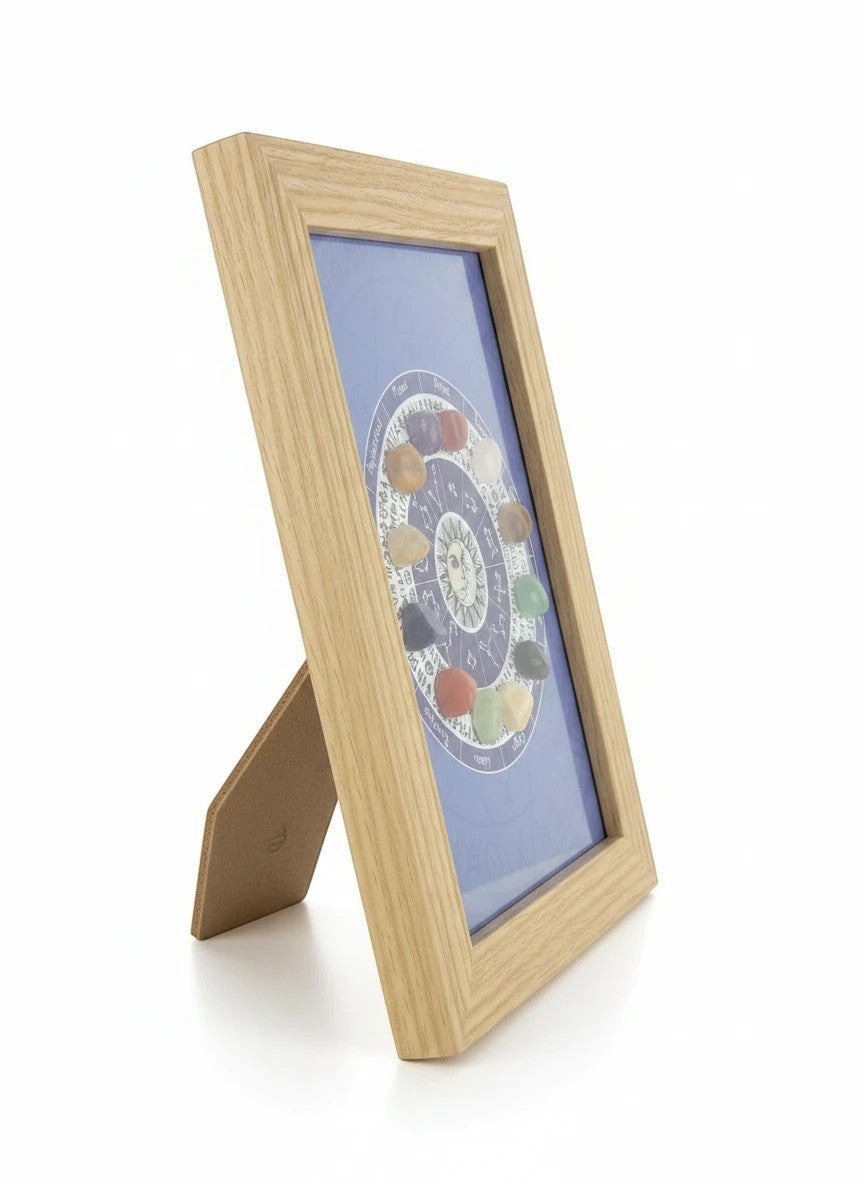 Treasured Energies framed zodiac crystal wheel wall art with colorful healing stones on a blue astrological background