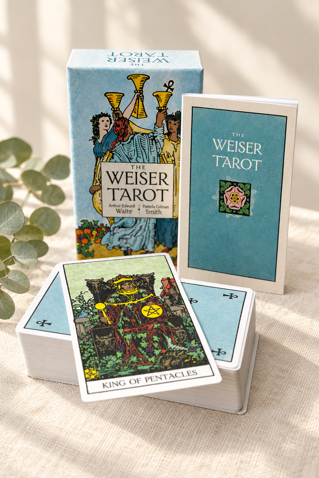 Weiser Tarot with King of Pentacles resting on the deck